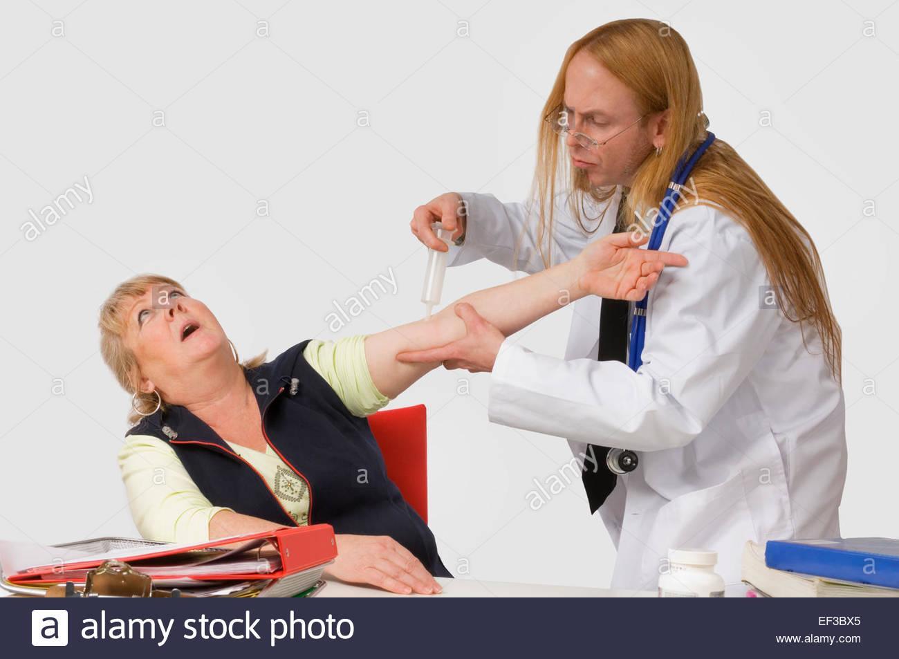 Image of a funny doctor giving a shot. 