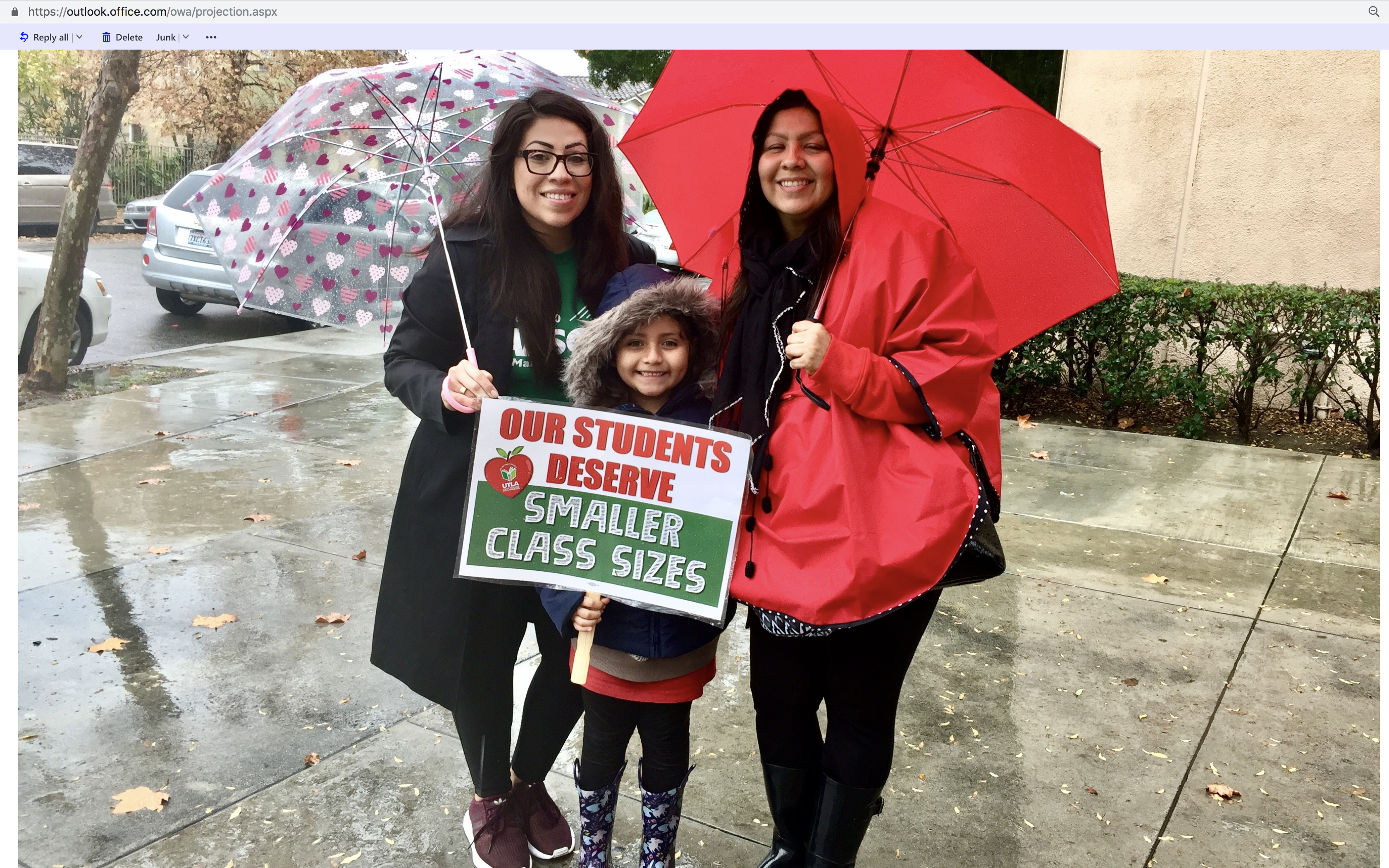 AFSCME Local 3090 Wendy Ruiz on the picket line with her child